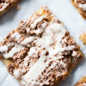 Apple slab pie starts with puff pastry that gets filled with tart apples and topped with an easy snickerdoodle crumble. Forget applie pie, this is what you want instead!