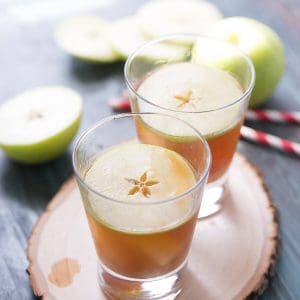Caramel apple cocktail is the adult version of the classic fall treat! Crisp rum, apple and caramel liqueurs make this the perfect beverage for fall!