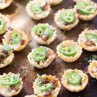 Simple queso funded bites will make your party! These cheesy two-bite snacks are made with a handful of ingredients and come together quickly!