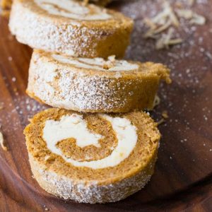 This pumpkin roll is a little different then the rest. This cake is filled with a creamy coconut filling instead of traditional cream cheese!