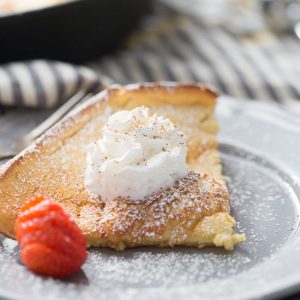 Want a simple yet impressive breakfast? This Dutch baby is made right in your blender and baked in a skillet for a golden, light and perfect pancake!