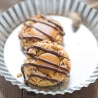 These thumbprints take on peanut butter,, caramel chocolate and nuts to create a unique twist on turtle cookies!