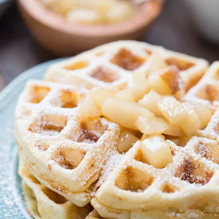 Homemade waffles made with browned butter and topped with rum spiced pears!
