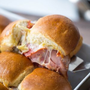 Party sandwiches at their best! These little guys have lots of Italian meats and cheese, then get baked until hot and melty!