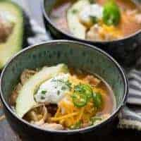 This slow cooker chicken chili is so easy! Let the slow cooker do all the work! This is a family pleasing recipe!