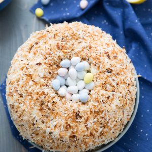 This Easter cake looks so fancy but it is rather easy to prepare! A subtle lemon bundt cake is the base while toasted coconut top it off!