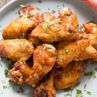 Dry rub chicken wings are like a party in your mouth! The spicy sweet coating is absolutely addictive!