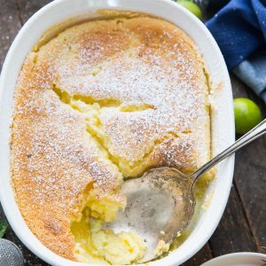 This pudding cake is perfect for summer! It is light, fluffy with a tangy key lime layer tucked underneath!
