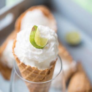 Frozen Key Lime Pie is the perfect summer time treat! The waffle cone makes it fun to eat!