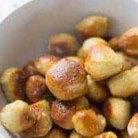 Soft pretzel bites are coated in melted butter and ranch seasoning for the perfect snack! Don't forget he Buffalo sauce!