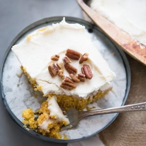 Love a good pumpkin roll but don't want to put in the time? I have just the solution! This easy poke cake takes everything we love about pumpkin rolls and turns it into an easy to assemble cake!