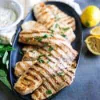 Grilled tilapia on platter