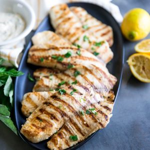 Grilled tilapia on platter