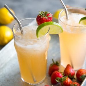 Bourbon cocktail with strawberries and lemonade