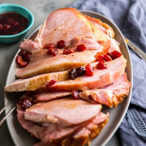 Baked ham sliced on a platter