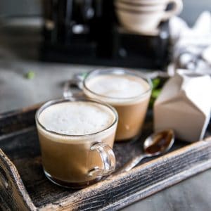 chocolate coffee with cream on the side